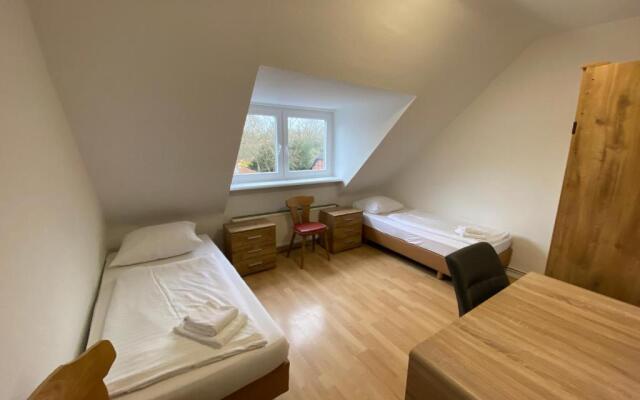 Othman Appartements Groß Buchholzer Straße 16a