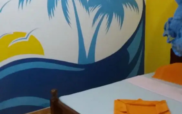Malika's Yellow House