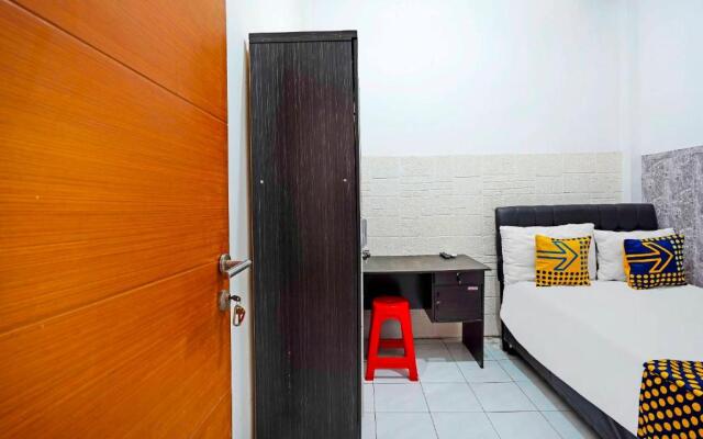 SPOT ON 91360 Swk 68 Syariah