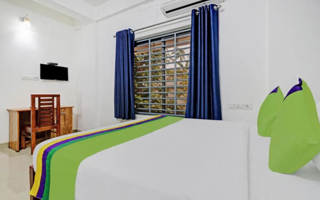 Treebo Nirupama, 750m from Aluva Railway station