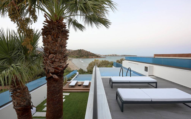 Beachfront villa with a heated pool
