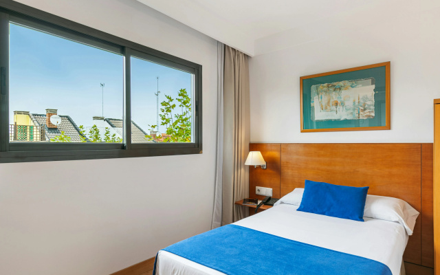 Отель Sercotel de los Reyes