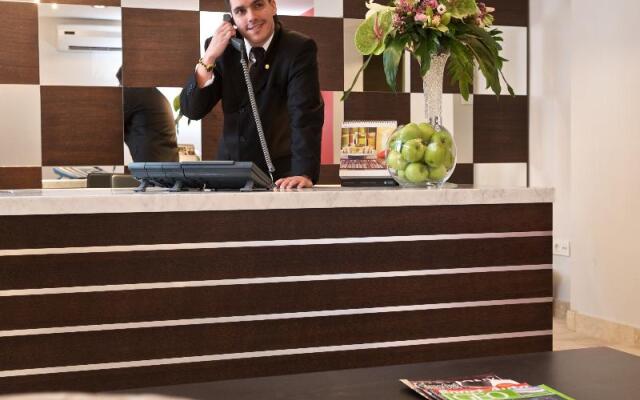 Escala Hotel & Suites