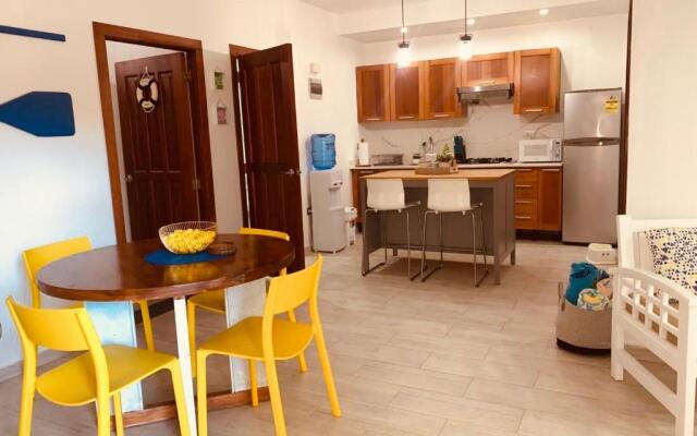 Lovely Beachfront 2 bedrooms condo with 2 pools