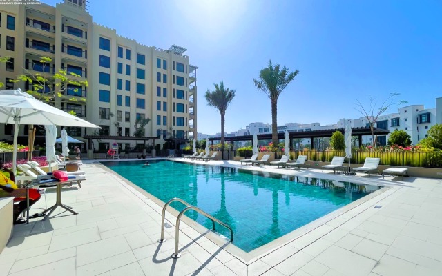 Elegant Pool View 2BR Apartment