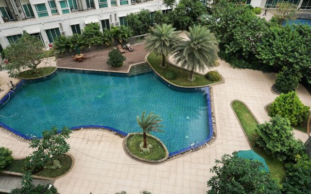 2BR Apartment with Sofa Bed at Woodland Park Residence By Travelio