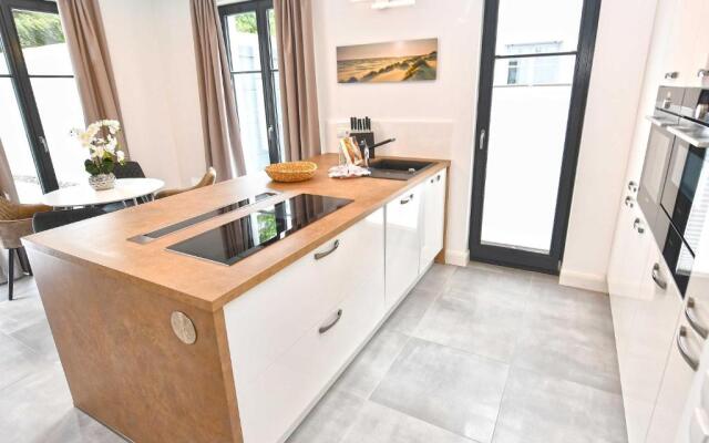 Villa "Levante" F659 Gartenwohnung mit Kamin, Sauna, Terrasse