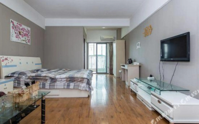 Qingqing Wojia Hotel Style Apartment