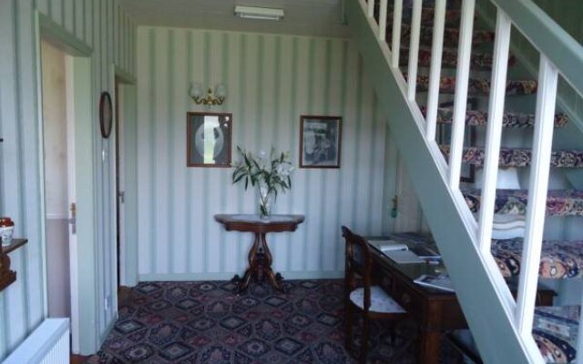 Heather Lodge Country House