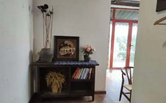 Mengzhou Hejia Courtyard Hotel