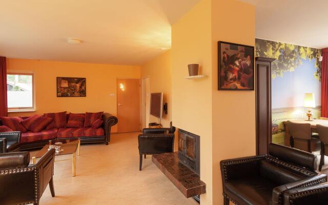 Cozy decorated house with fireplace, surrounded by forest