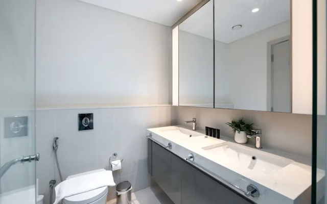 Elegant 2BR Emaar Beachfront Retreat