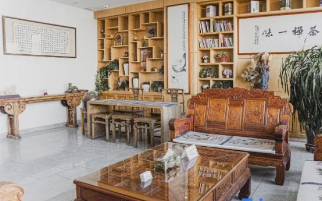 Yawan Impression Business Hotel (Songyuan Jinjiang Street store)