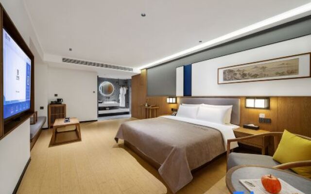 Qianna Meisu Hotel (Xinxiang Municipal Government High-speed Railway Station)