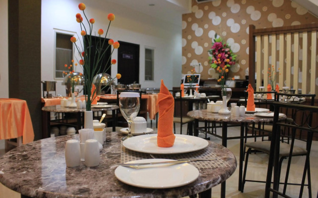 Airy Mapanget AA Maramis Manado