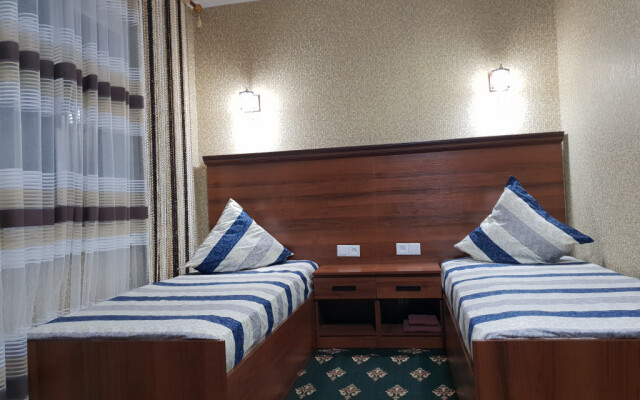 Status Guest house