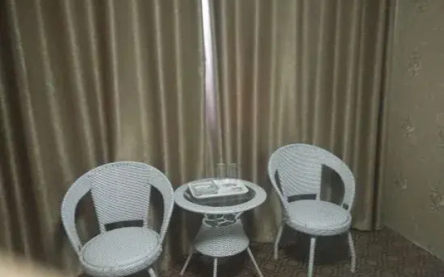 Huaxing Business Hotel