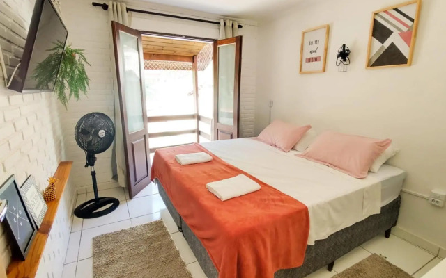 Casa de Tijolinho com Netflix e estacionamento