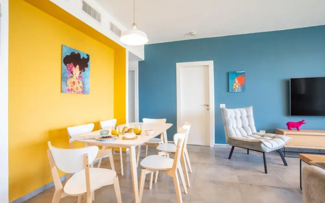 Vibrant Seaside Stay with Balcony by Sea N' Rent