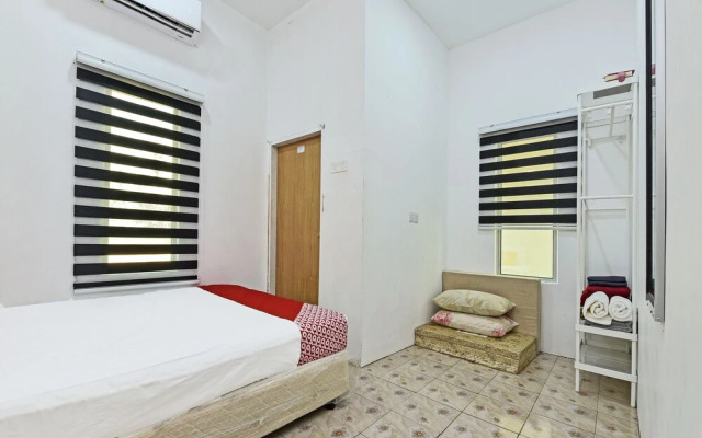 Capital O 90520 Fikri Wetland Guesthouse