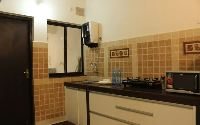 OYO 9364 Home Modern 2 BHK Pool View Candolim