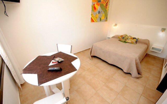 Aguaribay Apart Cabañas