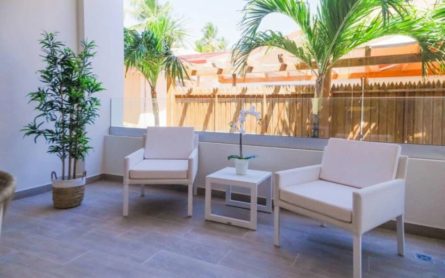 Modern and Spacious Condo Steps From the Beach