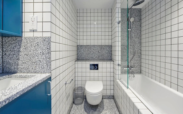 Upscale Two-bedroom Home in a Brutalist Setting