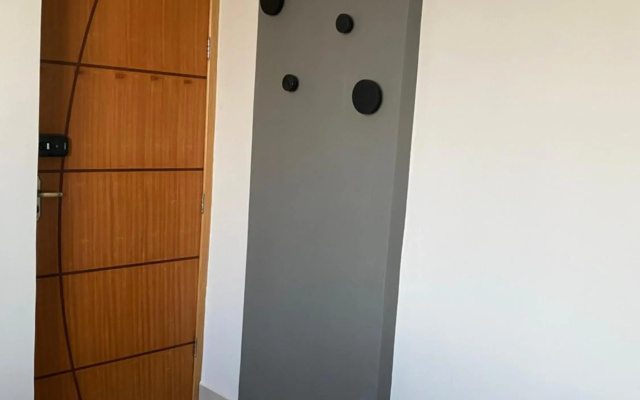 Apartamento novo ao lado do Rio Centro!