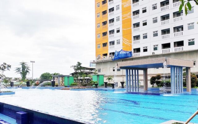 Furnished Studio with Comfortable Design Green Pramuka Apartment