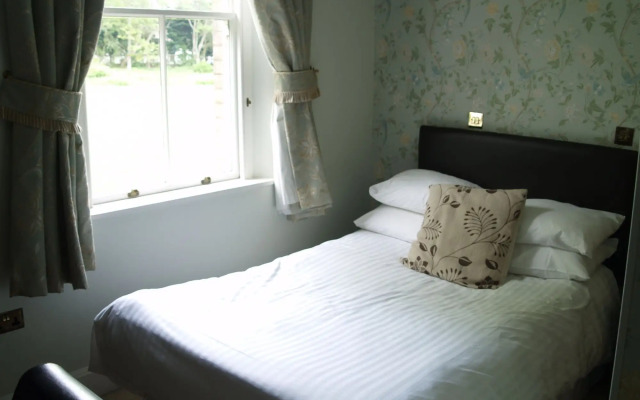 Woodland Manor Hotel