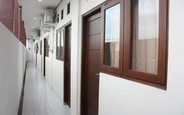 Nida Rooms Gelogor Carik Denpasar at Guest House Orchid