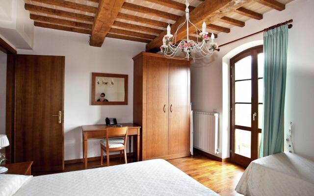 An agritourism complex with views of Assisi.