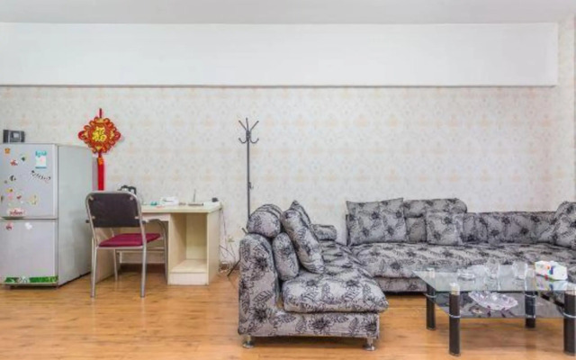 Qingqing Wojia Hotel Style Apartment