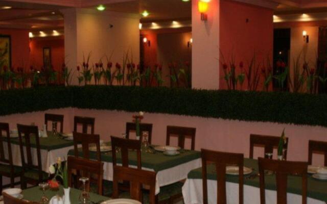 May Garden Club Hotel