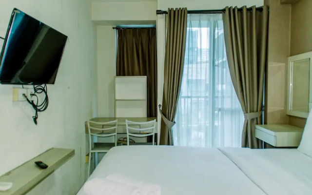 Homey And Warm Studio Room At Tifolia Apartment