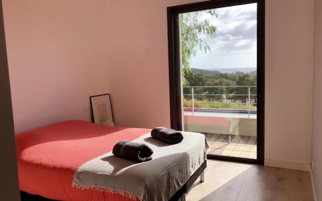 Splendide villa d'architecte vue sur la baie de Pinarellu