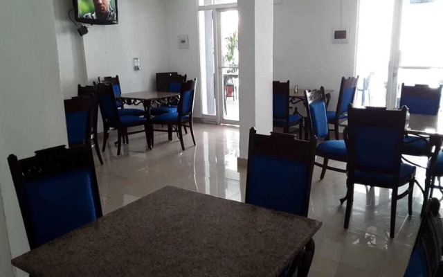 The Garden Hotel y Restaurant