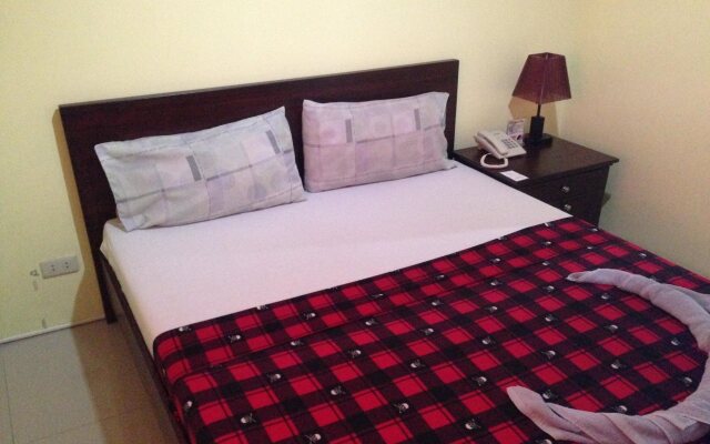 Poleng Suites Hotel