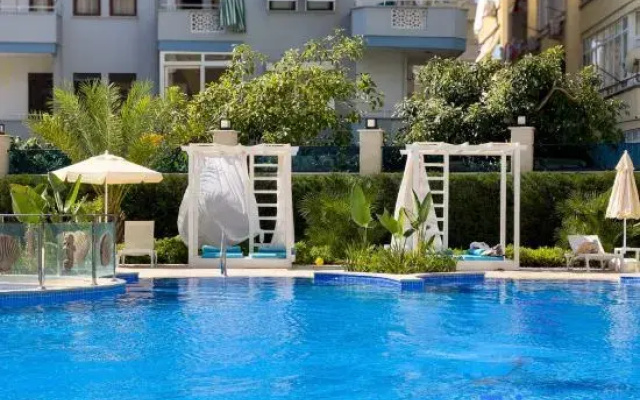 Apartment 1+1 Qoople Aria 32 in the center of Alanya