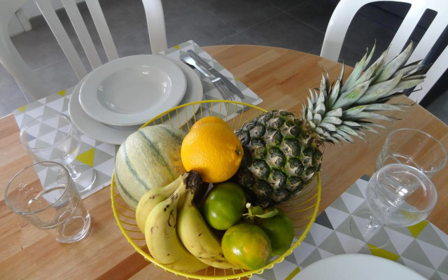 Haut de villa dans son écrin de verdure
