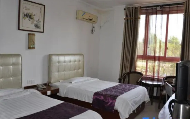 Tanbai Xinyuan Express Hotel