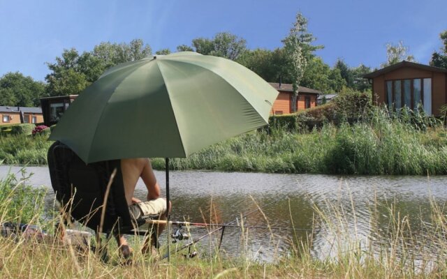 Comfy Chalet With a Dishwasher, Directly on a Pond
