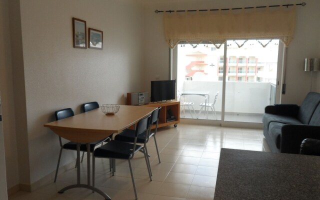 Apartamento Praia de Porches,izibookings