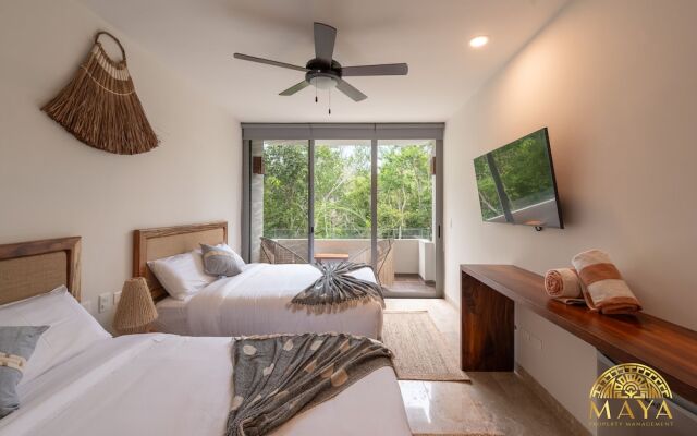 NHOA 208A Lux 2BR Condo Jungle View in Aldea Zama
