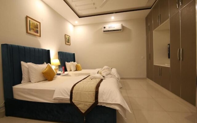 Cuzzy Inn Hotel Lahore