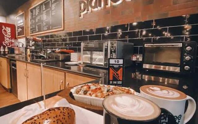 Grand Atrium Designer Apartment