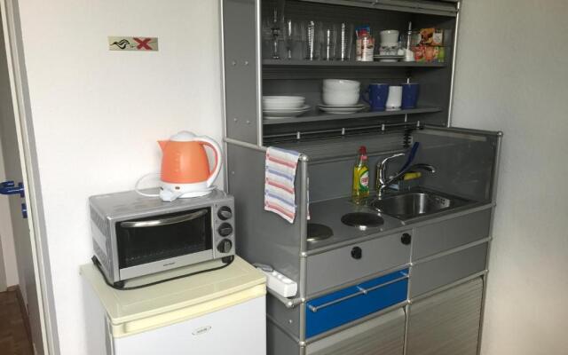 Apartmenthaus Zentrum Komfort Apartments mit Miniküchen verschiedener Größen