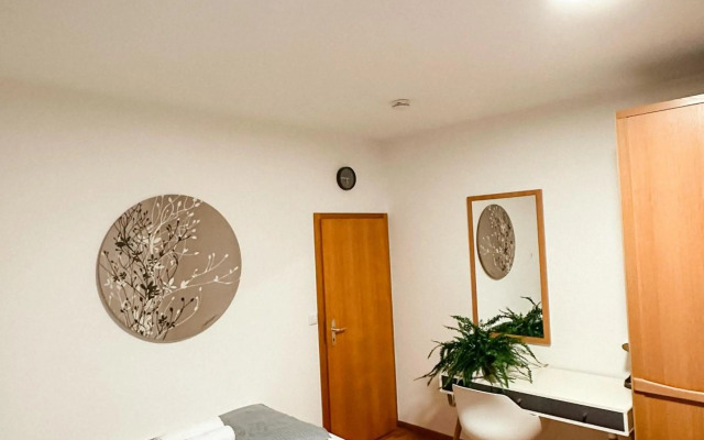 Suiteable Living - Boardinghaus mit Parkplätzen, WLAN und Waschraum