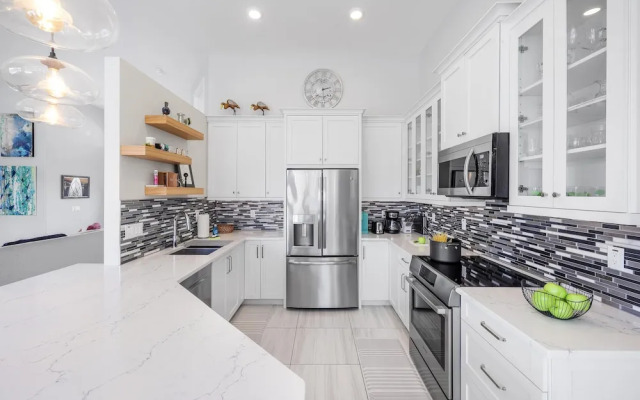 Stylish Waterfront Home With Pool and Private Dock